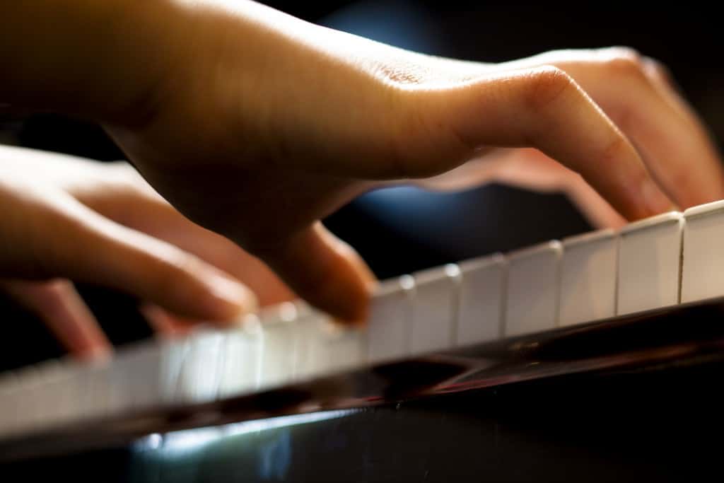 Hands Playing Piano